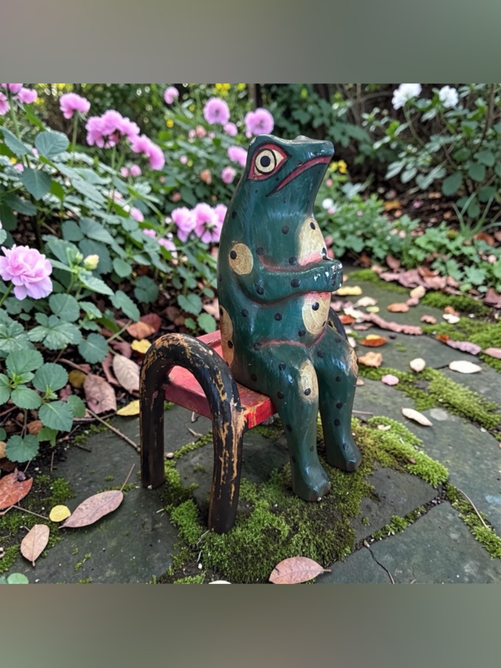 Wooden carved folk art frog on bench 9”